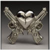 Схема вышивки «Сердце и два пистолета»