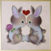 Схема вышивки «Влюбленые кролики»