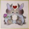 Схема вышивки «Влюбленные кролики»